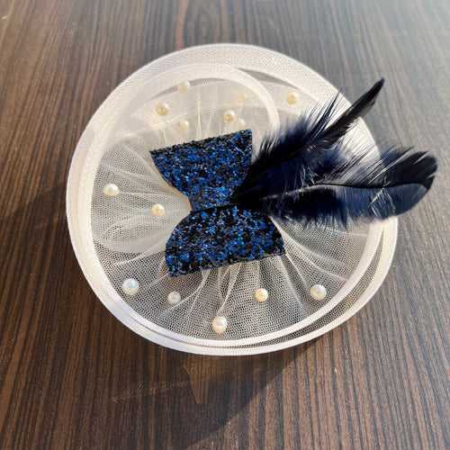 Twisted White Fascinator with Blue sparkle Bow