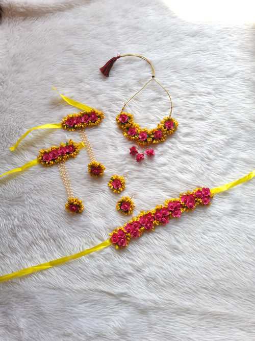 Vibrant yellow and pink color flower jewellery set for haldi
