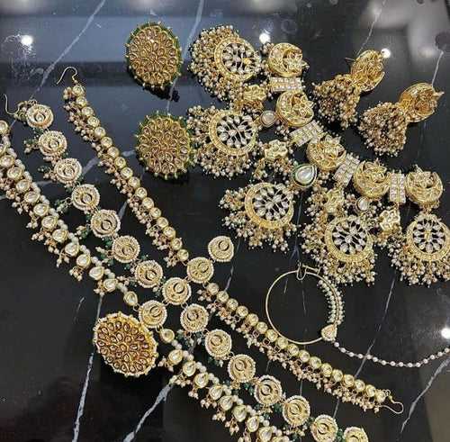 Opulent Radiance: Heavy Kundan Golden Bridal Set by Zevar Jewellery