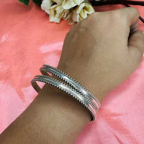 MOANA. Stunning silver bangles with rawa  work