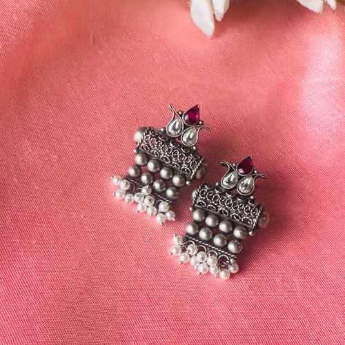 MAZBEEN. Temple designed kemp  and Kundan studs in pure silver.