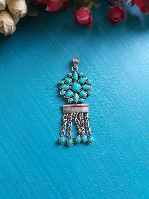 TUHINA. The turquoise pendant.