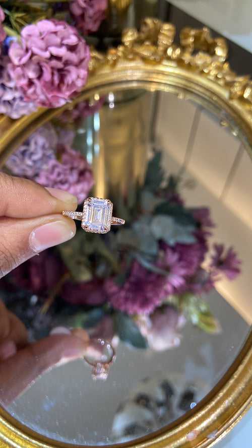 Emerald cut halo promise ring
