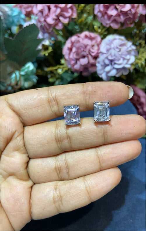 4.5 ct screwback Emerald cut solitaire