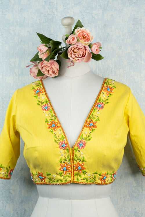 Light yellow hand embroidered blouse