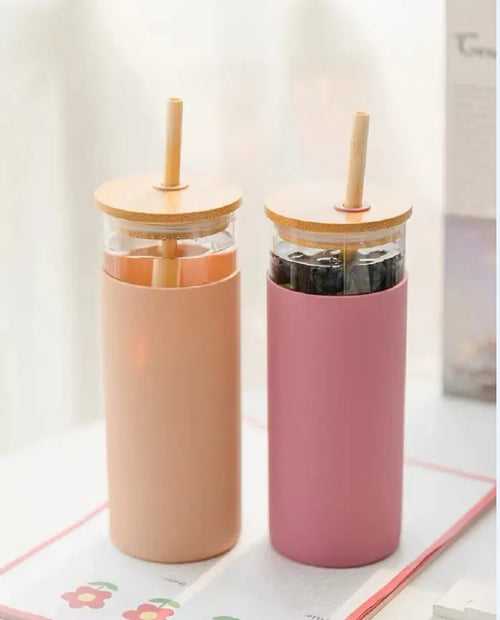Glass travel bottle with straw