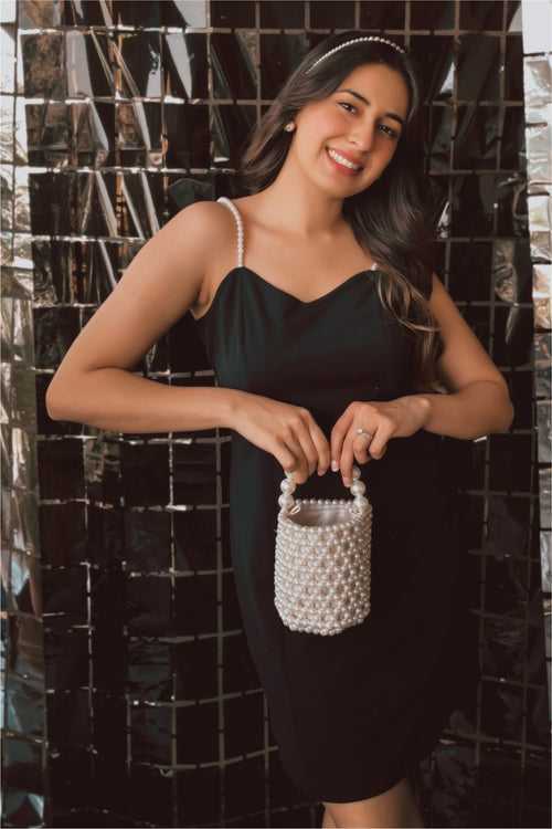 Sania Chadha In Black Pearl Strap Short Dress