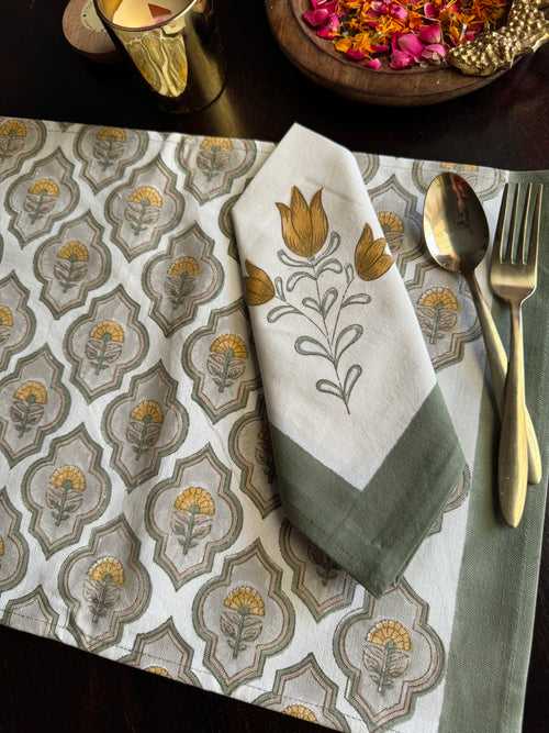 A PAIR OF HANDBLOCK PRINTED TABLE MAT AND NAPKIN SET