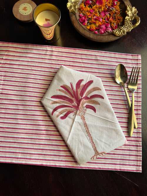 A PAIR OF HANDBLOCK PRINTED TABLE MAT AND NAPKIN SET