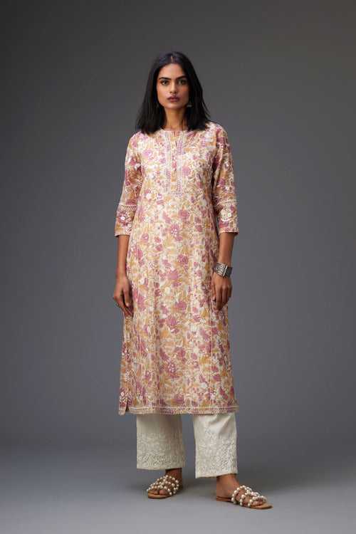 Pink and mustard hand block printed cotton chanderi kurta set with all-over jaal embroidery and small assorted flowers embroidery at side panells, highlighted with sequins handwork.