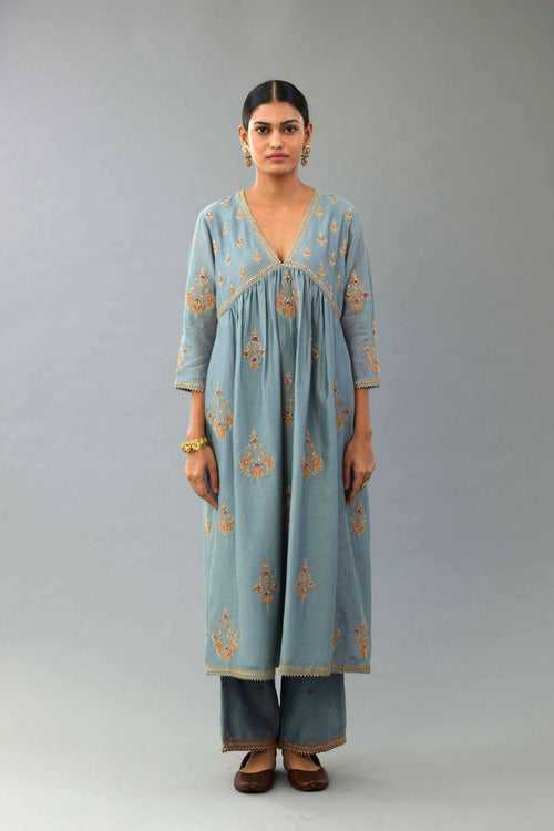 Light blue silk chanderi kurta-dress set with all-over zari, dori and contrast silk thread embroidery, highlighted with gold sequins work.