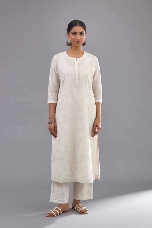 Off-white Handspun handwoven cotton kurta with all-over jaal embroidery and small assorted flowers embroidery at side panells, highlighted with sequins handwork.