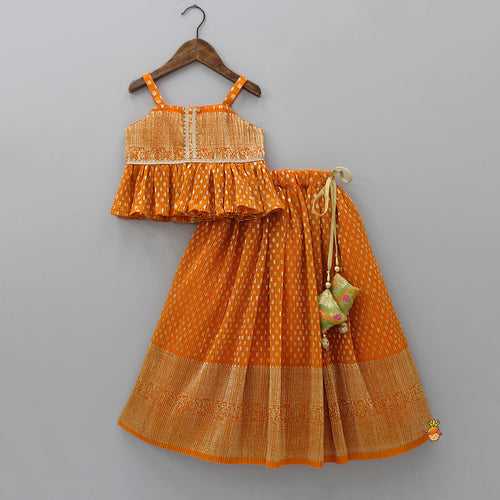 Rust Orange Pleated Georgette Top And Lehenga With Hair Clip