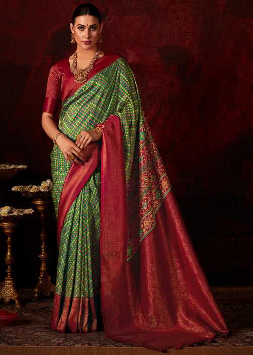 Red & Green Patola Printed Silk Saree with Contrast Blouse