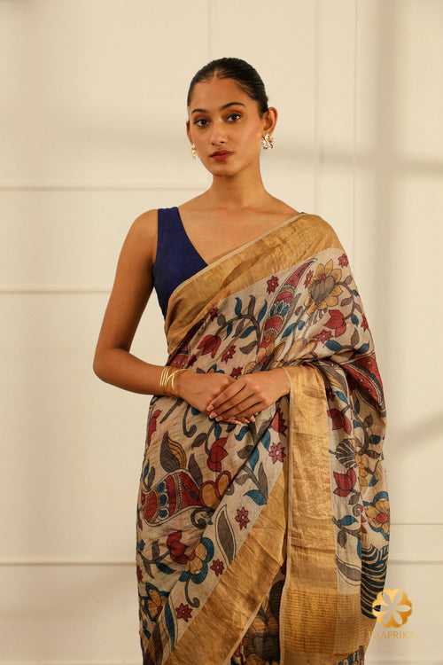 Handwoven Cream Tussar Silk Saree with Floral Creepers and Leaves Depicted in Natural Kalamkari