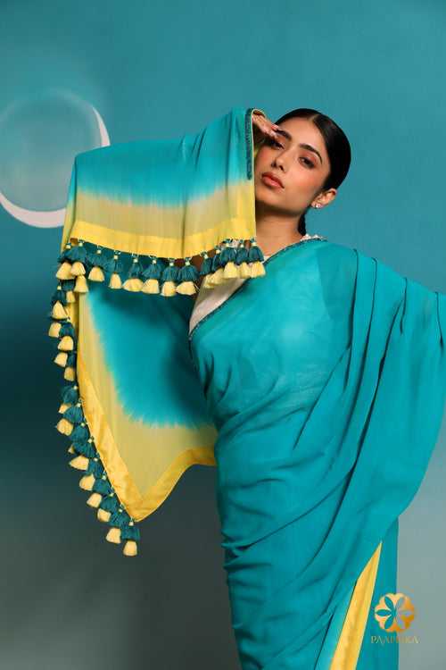 Teal Georgette Pure Saree: Elegance and Charm with a Pastel Yellow Ombre Border