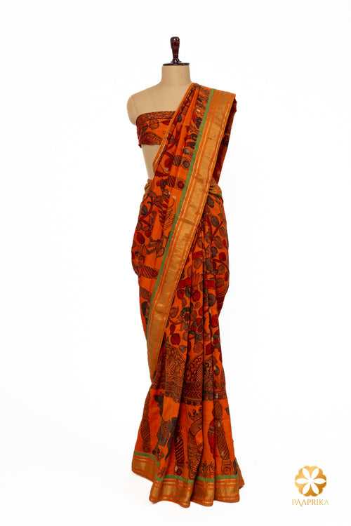 Orange Paithani Saree with Contrasting Green Border Adorned with Natural Kalamkari Floral and Animal Figures