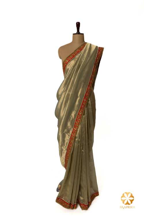 Aqua Blue Handcrafted Tissue Saree with Orange Contrast Embellished Border