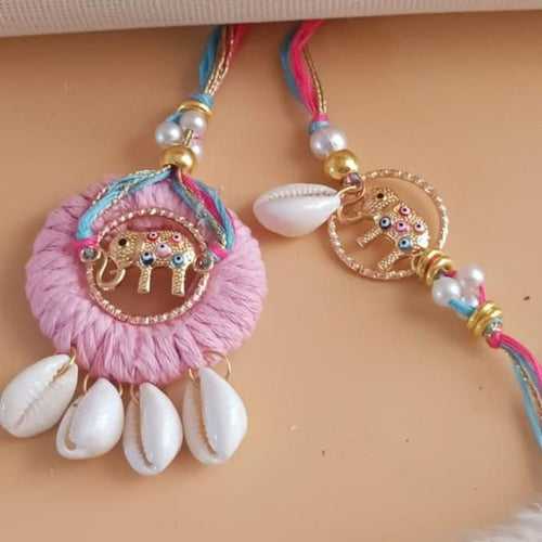 Pretty Shell Rakhi With Elephant & Charm