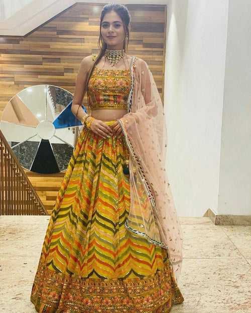 LAUNCHING YELLOW BRIDAL WEAR GEORGETTE HEAVY SEQUENCE WORK LEHENGAS