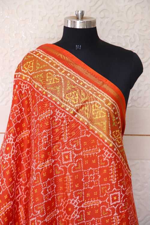 Traditional Navratna Manekchowk mix design in orange and red combination