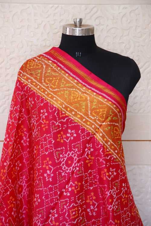 Patola Dupatta in pink colour with traditional Manekchowk and Navratna mix design