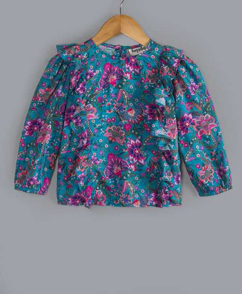TURQ AND PURPLE FLORAL PRINT TOP WITH FRILLS ON THE FRONT SIDES