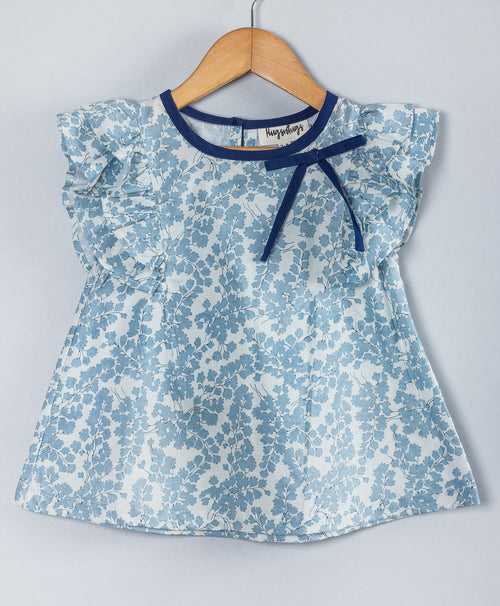 SOFT BLUE ALL OVER LEAF PRINT TOP WITH NAVY NECK BINDING AND TIE UP