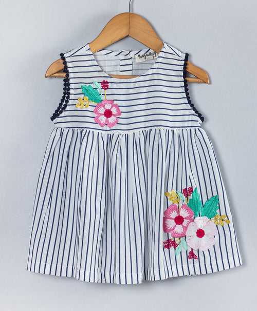 BLACK AND WHITE STRIPED PRINT TOP WITH FLOWER EMBROIDERY