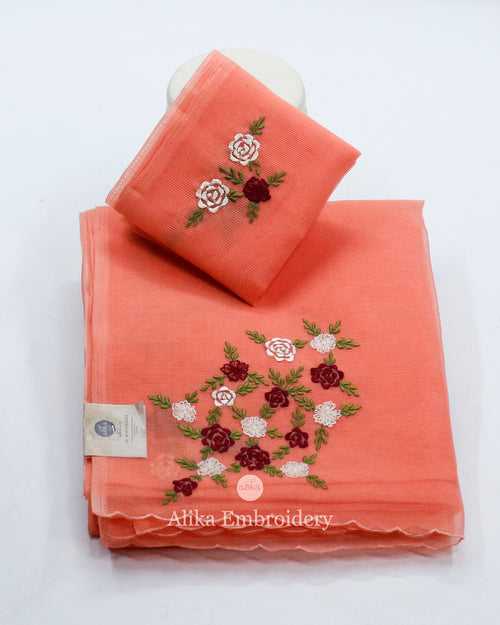 "Vibrant Orange Silky Kota Saree with Red & White Floral Embroidery | Exquisite Ethnic Elegance"