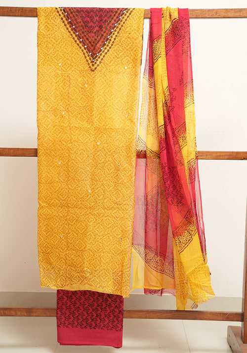 Yellow and Red Unstitched Super Net Salwar set