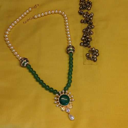 Regal Peacocks in Green Onyx with Golden Pearl Necklace