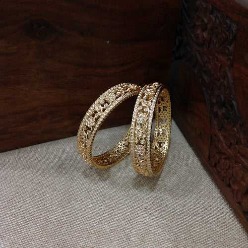 Golden and Cubic Zirconia Bangles