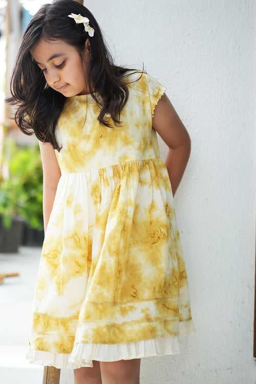 ‘Turmeric Hues’ girls dress in ochre yellow hand tie dye