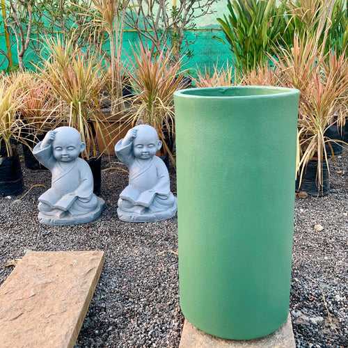 Buy tall cylinder planter, flower pot in luxury leather finish.