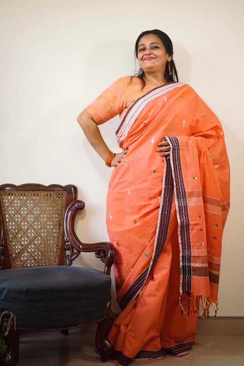 Peach Orange Khadi Jamdani Trishulam Saree