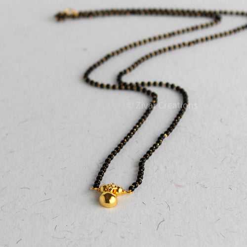 Silver Mangalsutra chain and vati with gold polish