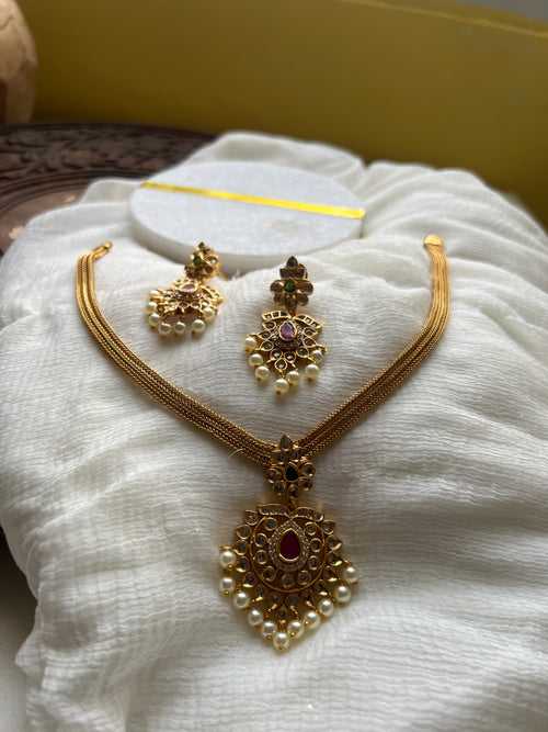 Cutwork pendant choker with matching earrings