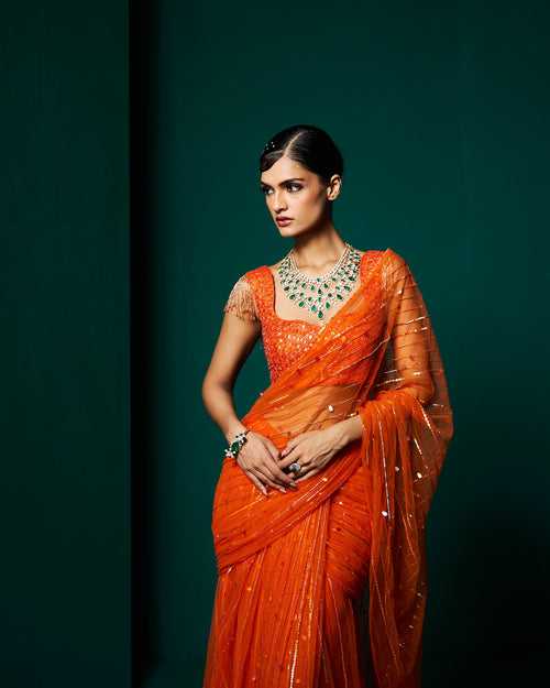 vithi Net drape saree with
Blouse - Persimmon Orange