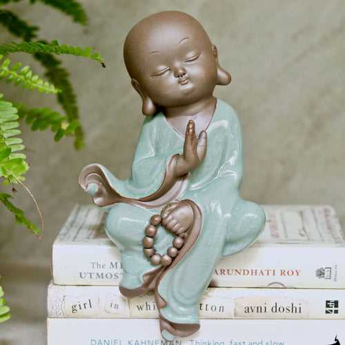 Ceramic Buddhist Monk Figurine Sitting