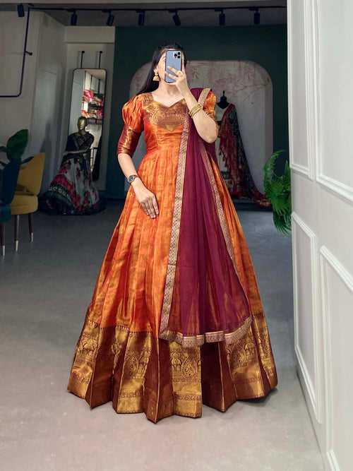 Regal Orange Zari Woven Kanjivaram Gown with Net Dupatta