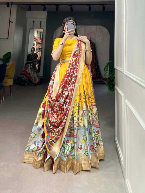 Alluring Yellow Dola Silk Lehenga Choli with Enchanting Kalamkari Prints