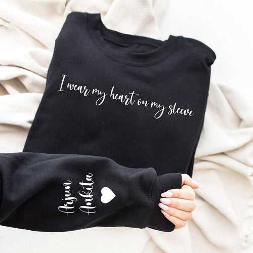 Heartstrings Harmony: Customized Sweatshirt with Your Loved One's Name Adorning the Sleeve