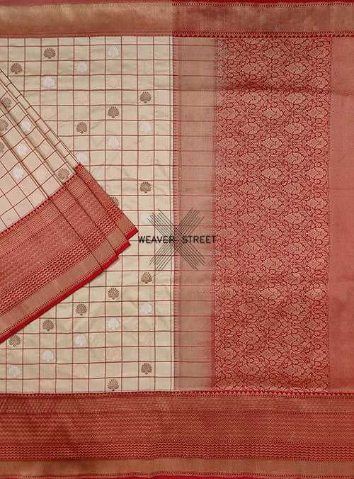 Beige katan silk handwoven Banarasi saree with kadwa buti in checks