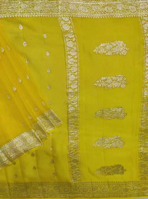 Yellow light weight chiffon handloom Banarasi saree with silver booti