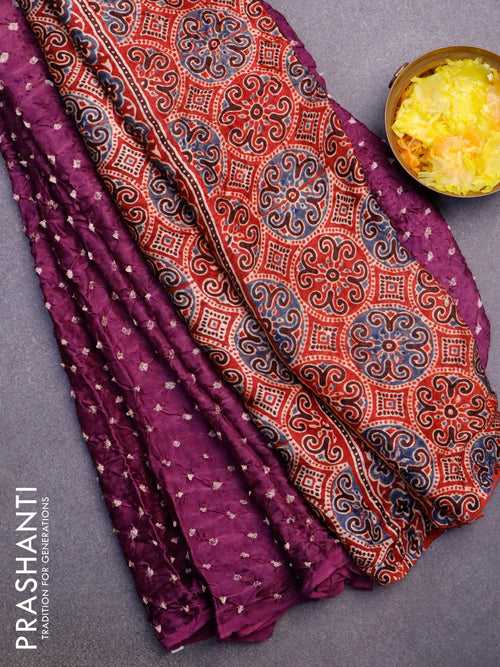 Modal silk saree purple and maroon with allover bandhani prints and ajrakh printed pallu