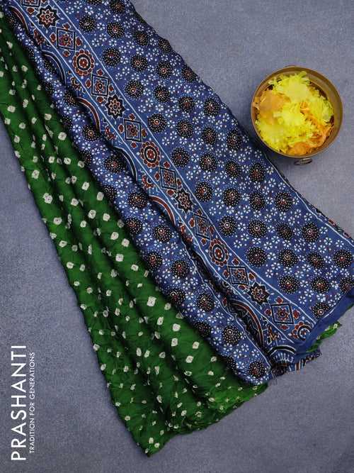 Modal silk saree green and blue with allover bandhani prints and ajrakh printed pallu
