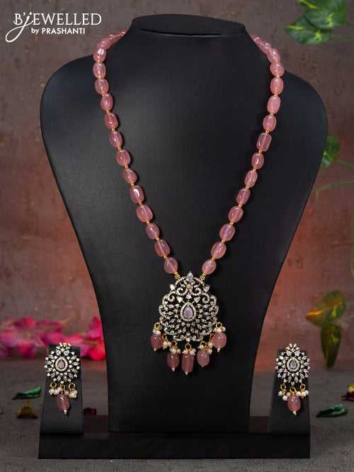 Beaded pink necklace with pink & cz stones and beads hanging in victorian finish