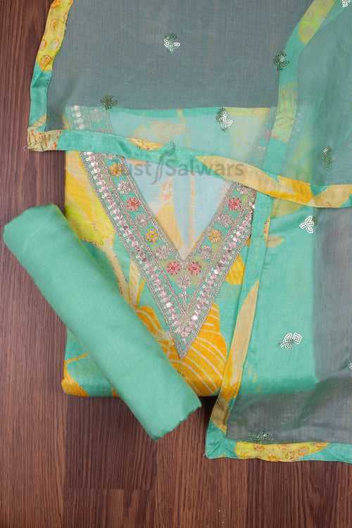 Green and Yellow Colour Muslin Silk Dress Material