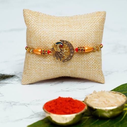 Designer Peacock Rakhi for Brother with Lord Ganesha Idol and Roli Chawal Pack, Raksha Bandhan Greeting Card